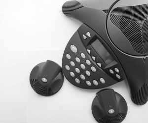 an overhead picture of a phone used for conference calls